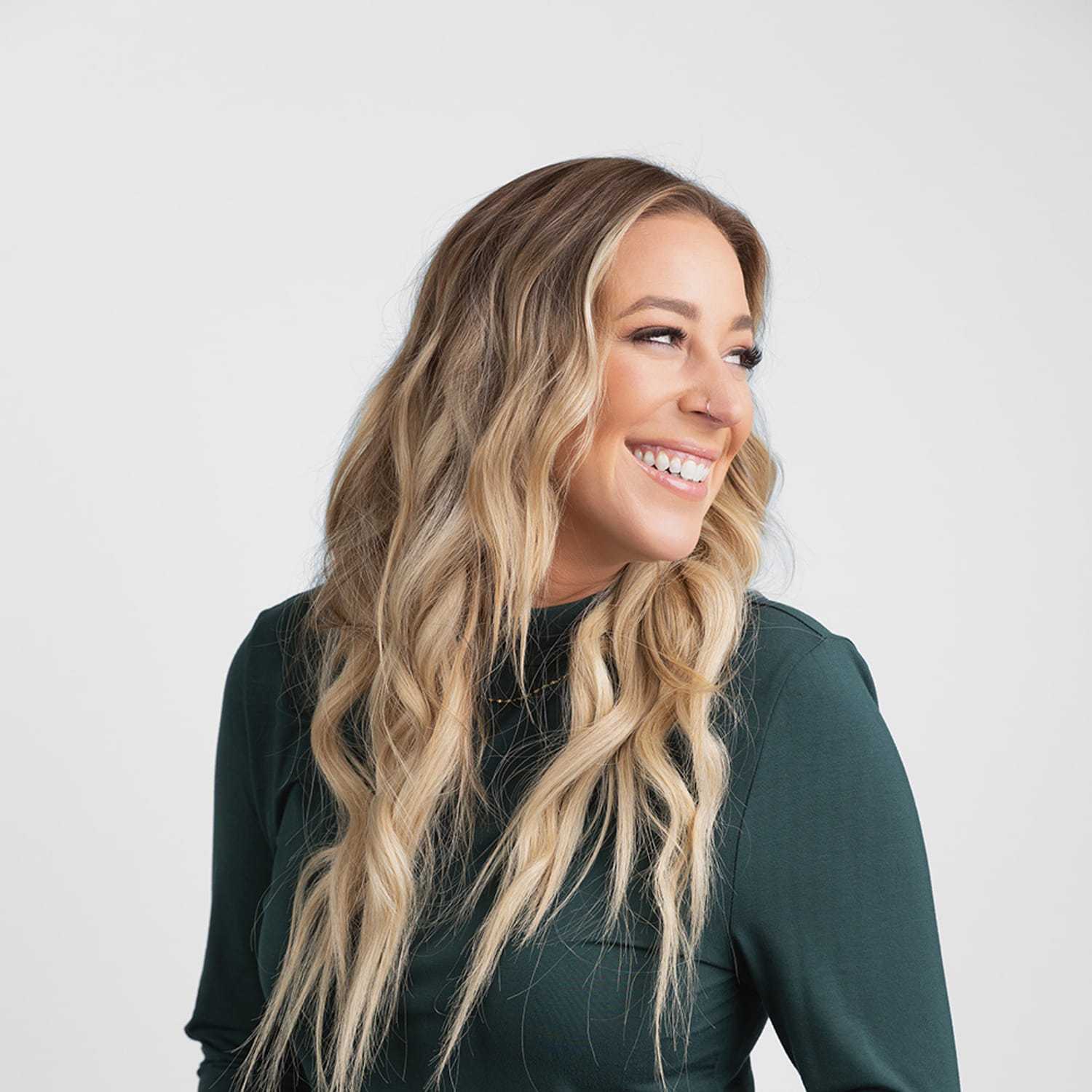 Portrait of Cecily, a professional stylist at Bobby Cooper, showcasing their expertise and style.