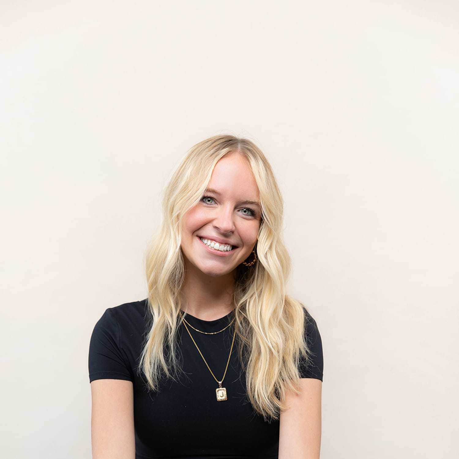 Portrait of Jojo, a professional stylist at Bobby Cooper, showcasing their expertise and style.