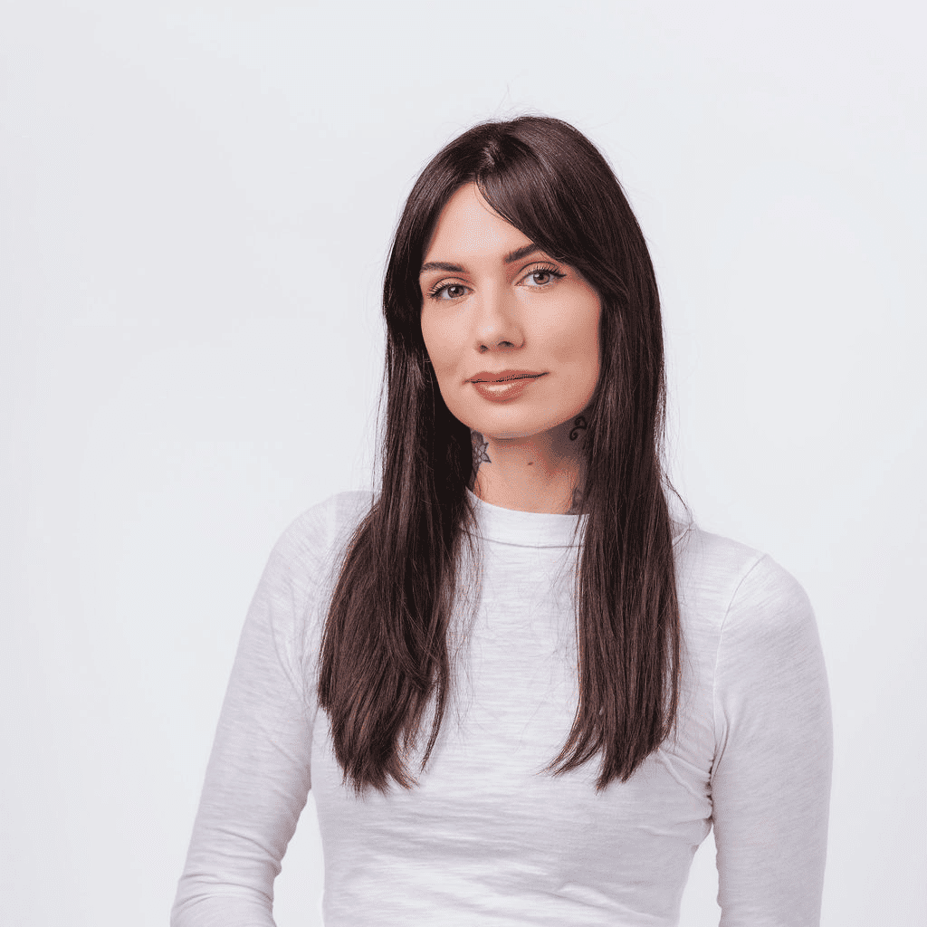 Portrait of Tamara, a professional stylist at Bobby Cooper, showcasing their expertise and style.